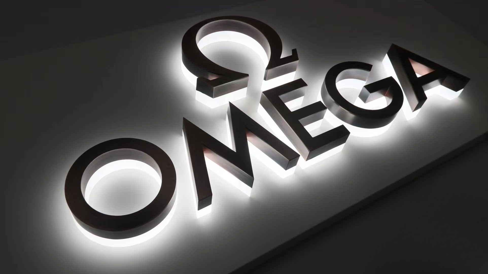 Halolit Channel Letters | Brushed Stainless Steel | Red Bronze